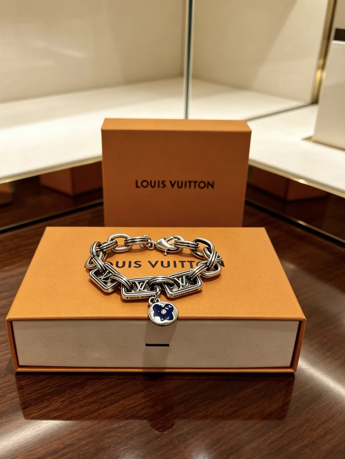 Louis Vuitton Silver Tone Bracelet with Monogram Charm